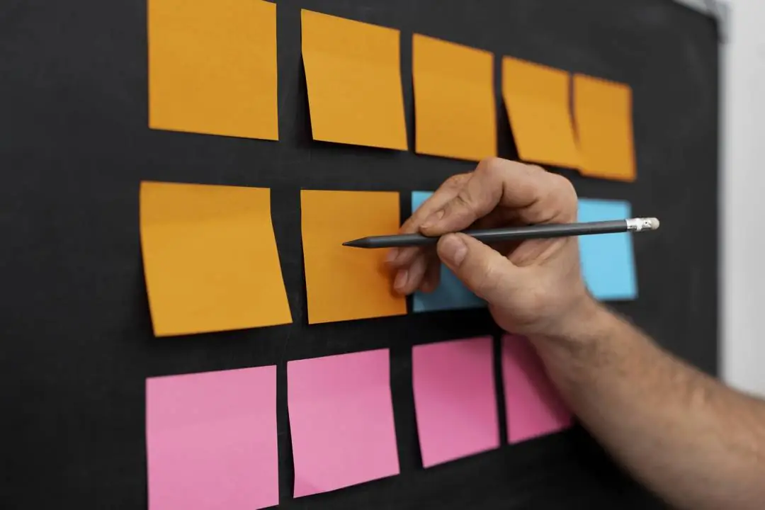 side-view-writing-a-moment-in-orange-post-it