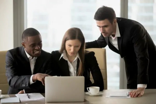 multinational business colleagues working together