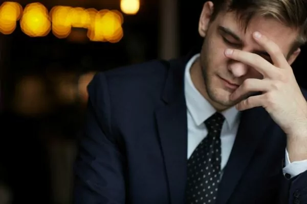 tired-man-waiting-for-coffee